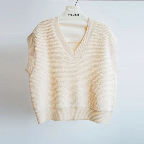 Maglione dolcevita senza maniche in maglia a trecce