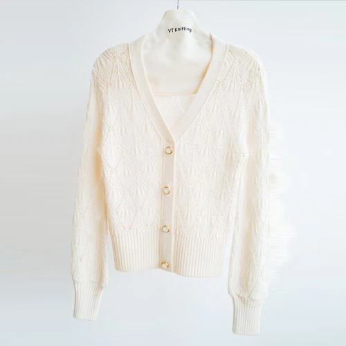 Maglione in maglia di lana a trecce da donna